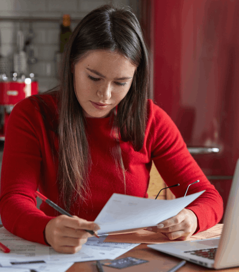 Student receiving an accurately translated academic document for university admission and study abroad applications.