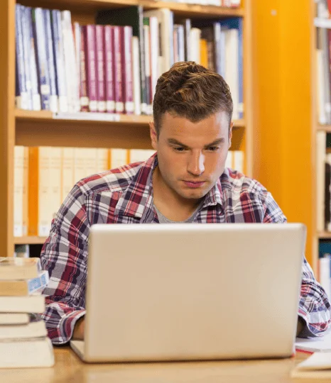Student in Manhattan using academic translation services to ensure their transcripts and diplomas are accurately translated.