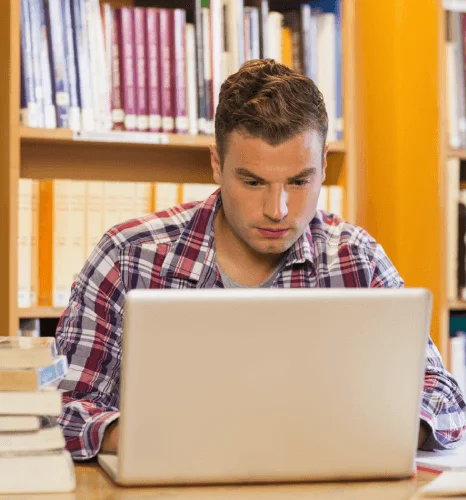 Student using translated academic transcripts with the help of certified translation services in Times Square.
