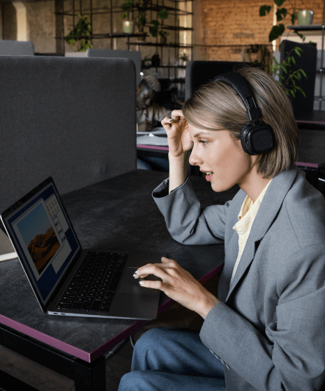 A professional applying open captioning services using strict accessibility guidelines to improve content usability.