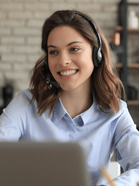 A commuter watches a phone video with accurate corporate video captioning services in a noisy station where audio fails.