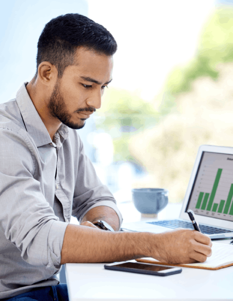 A specialist checks FX gains and losses lines, validating financial statement translation across languages for currency.