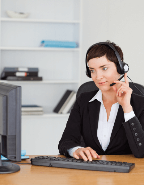 An expert transcriber providing AI noise reduction features in WMA Transcription Services for clearer audio output.