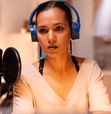 A creator checks per-minute rates as Affordable Deep Voiceover Services show simple project pricing with no subscription.