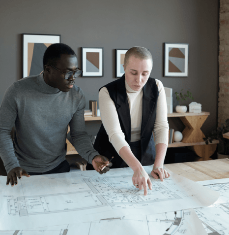 A CAD specialist checks Architectural Translation Services file formats, exporting a DWG set with preserved layers.