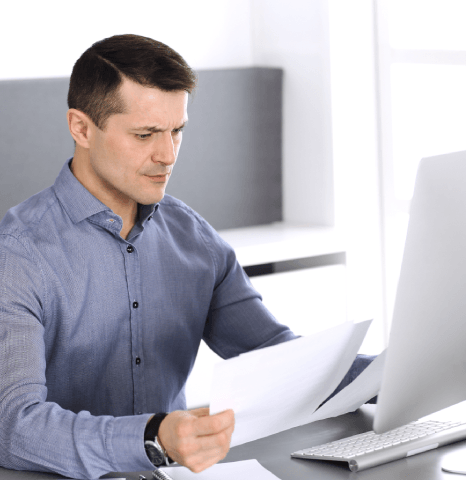 A manager reviews an itemized quote for Architectural Translation Services, comparing word rate and file complexity.