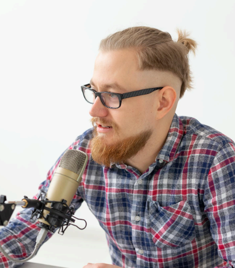 An editor syncs German Voice Over Services audio to video on a timeline, checking lip sync and loudness meters.