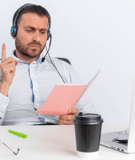 A compliance manager reviews descriptive video services notes against ADA and FCC rules on a training video checklist.
