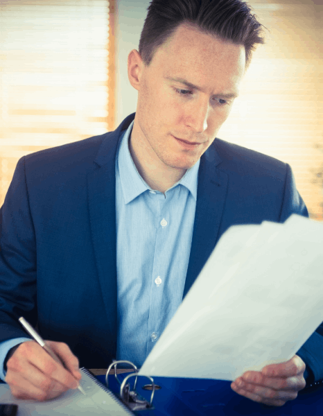 An accountant reviews an audit report translation, relying on chinese translation services new york for financial compliance.