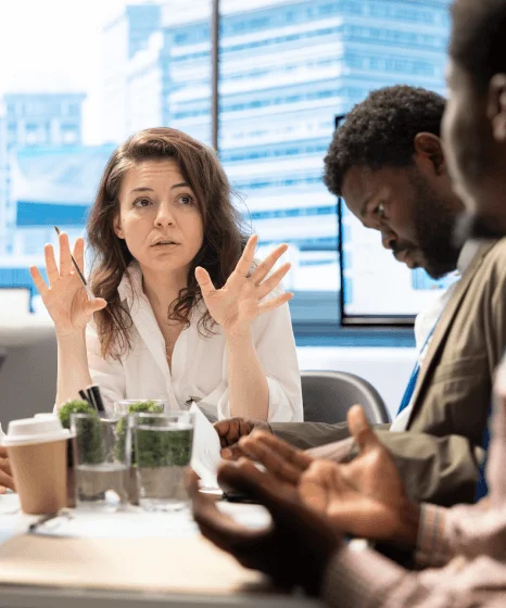 Accountants compare a balance sheet draft while speed translation services keep financial and commercial figures consistent.