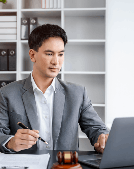 Lawyer using Bengali translation services in New York for legal documents, ensuring precision and accuracy for contracts.