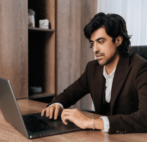 A designer uses urdu typesetting services to format a book spread in Unicode with print-ready margins and headers.