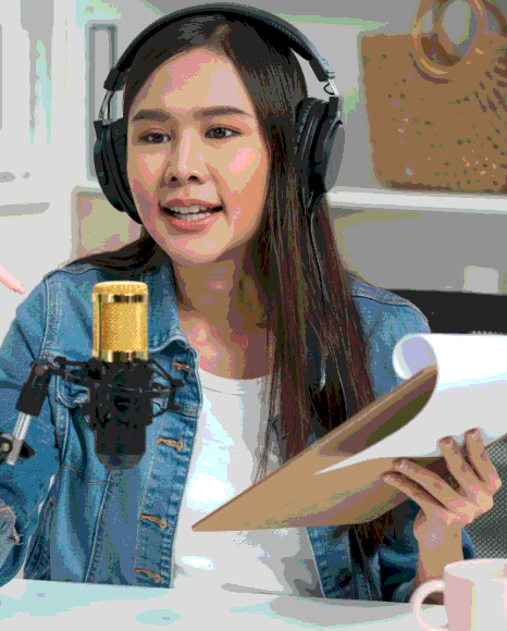 A voice actor records Tagalog Voice Over Services in a booth, using a calm classroom tone for e-learning modules.