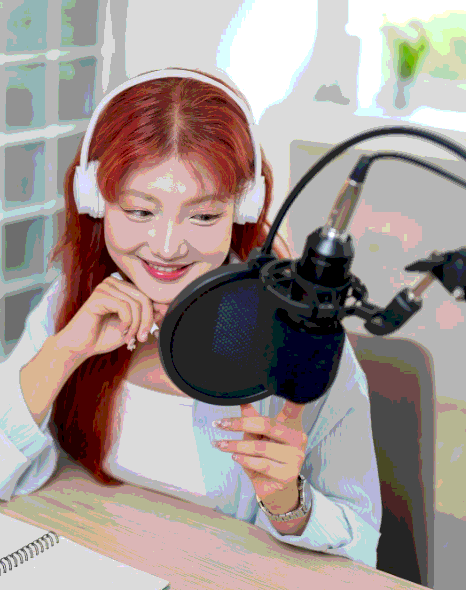 In a studio booth, an engineer monitors Korean Voice Over Services for technical scripts with clear terms and pacing.