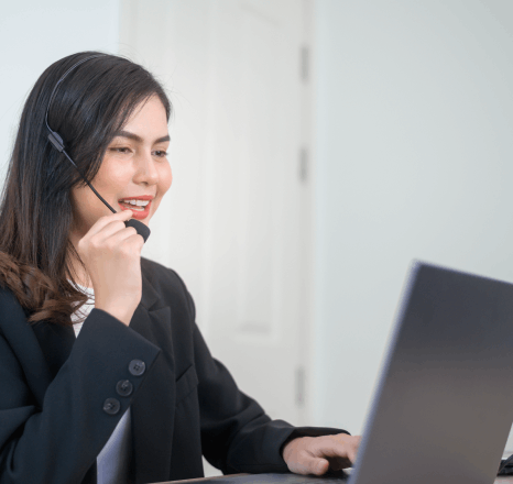 A brand manager reviews a voice style guide as Telephone Voiceover Services match corporate tone across prompts.