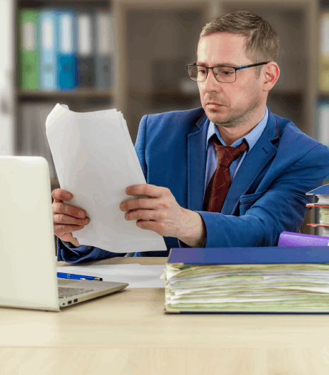A project manager assigns tasks in a workflow tool, coordinating Serbian translation services for business content launches.