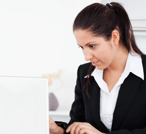A translator prepares a USCIS certified translation packet for visa applications, showing fast translation services.