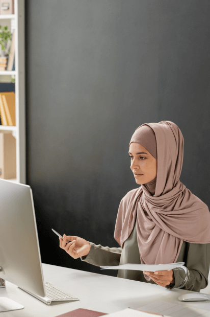 Customer receiving certified Arabic Translation Services ensuring accuracy and trust for official submissions.