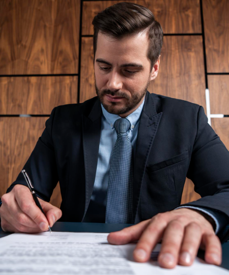 A certified translator signs a statement for Birth Certificate Translation services in New York, confirming accuracy.