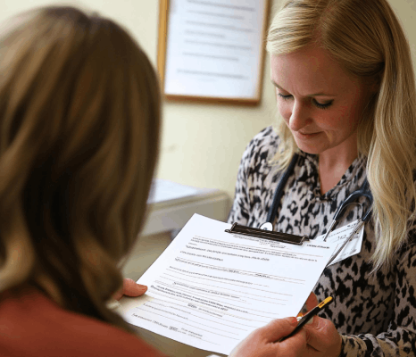 A translator applies a certification statement to a file for Birth Certificate Translation services in New York for official.