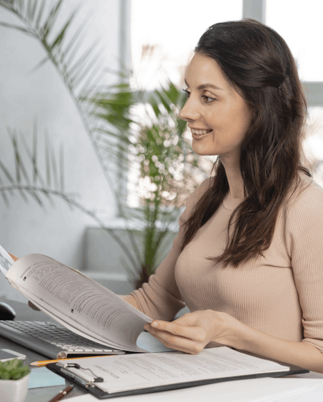 A reviewer checks a certified translation packet and checklist, using corporate document translation services for audits.
