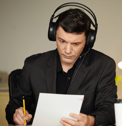 A certified transcriptionist checks ISO and GDPR steps while delivering government transcription services for a policy.