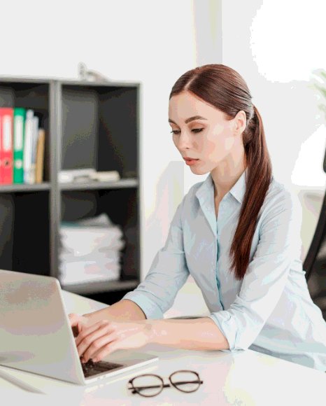 A clerk checks a certified Marriage Certificate Translation services in New York page against USCIS form details at a desk.
