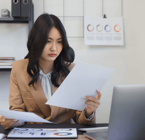 A certified linguist stamps a legal survey translation packet, showing Survey Translation Services prepared for official.