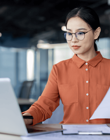 Certified translator works on pharmaceutical research documents, ensuring accuracy and compliance for submissions.