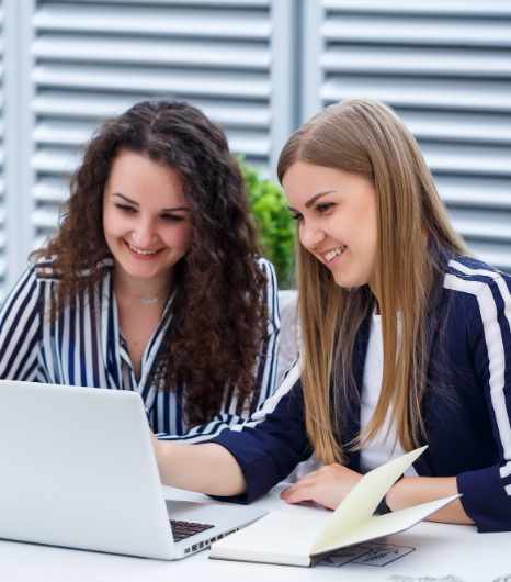 Two reviewers compare dates and endorsements during certified Visa Translation services in New York for visa submissions.