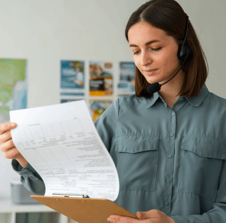 A USCIS packet checklist sits beside translated certificates as Javanese translation services verify names and dates.