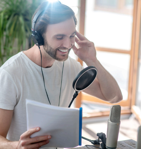 A project manager reviews a script for clear, natural audio delivery while coordinating Italian Voice Over Services.