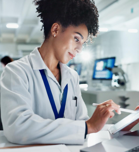 A linguist formats a protocol for pharmaceutical translation services in New York, showing the core offering workflow.