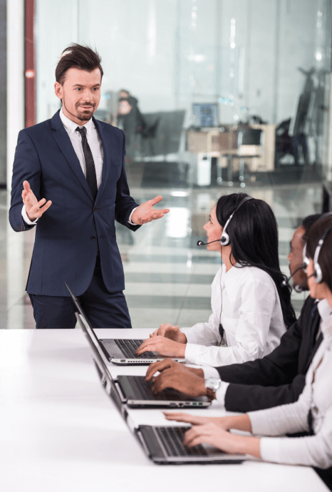 A captioner applying open captioning services to corporate training videos, ensuring clarity for all employees.