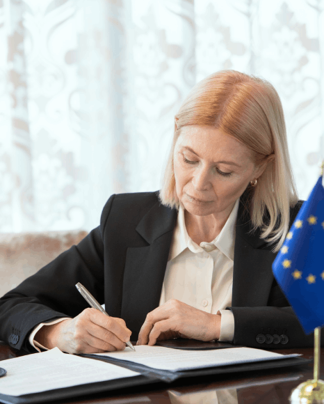 A paralegal compares a Slovak court filing to the English draft, using Slovak translation services for legal records.