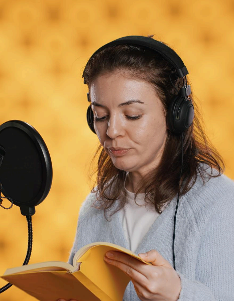 A linguist reviews an Italian script for cultural nuance before recording Italian Voice Over Services for a campaign.