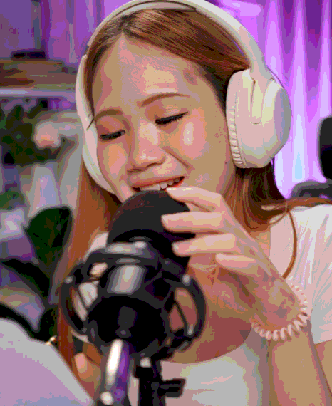 A localization producer reviews cultural notes while recording Korean Voice Over Services for culturally relevant content.