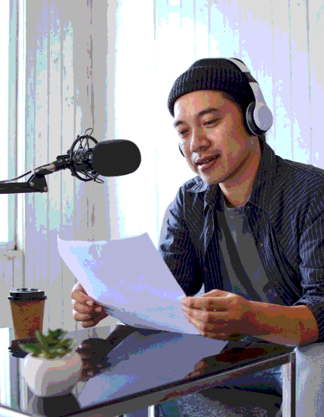 A linguist adapts jokes and local references as Tagalog Voice Over Services are prepared for culturally relevant videos.