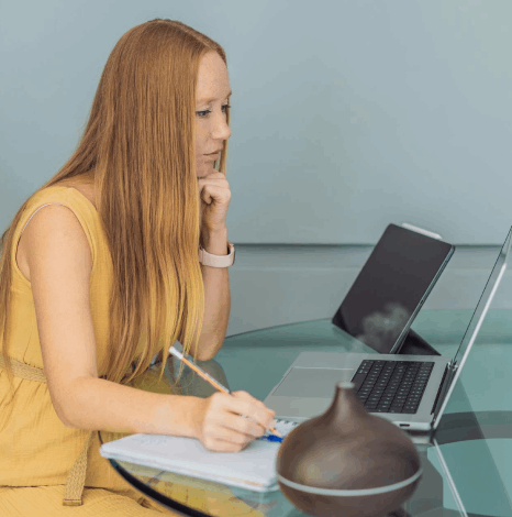An editor marks laughter and pauses in a transcript using market research transcription services for diverse clients.