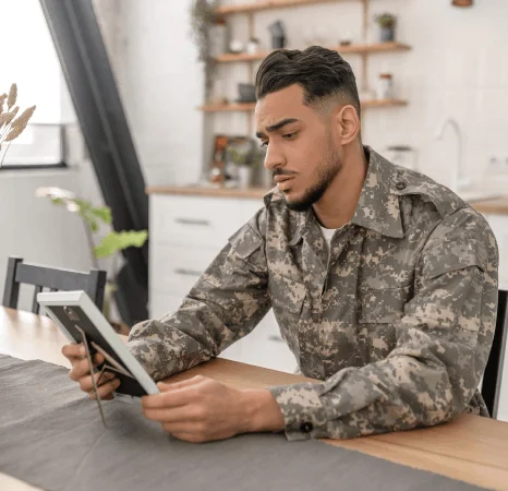 A compliance officer reviews integrated regulatory requirements, including defence translation files, to ensure security.