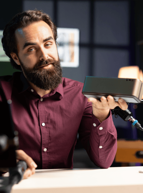 A voice over artist listens to multiple character demos on headphones, comparing different video game voice over services.