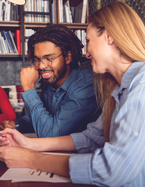 An editor reviews multilingual subtitles for diverse audiences on a webinar, using language subtitling services for clarity.