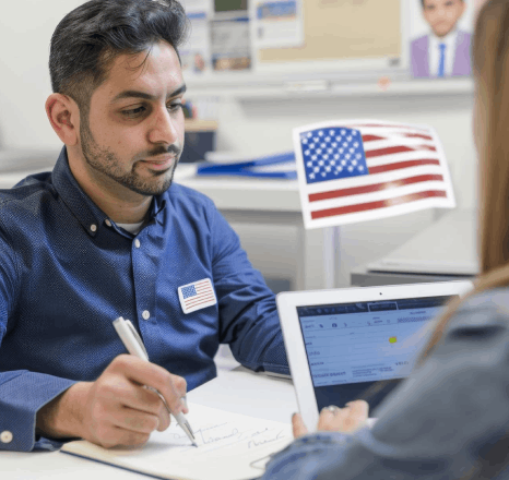 A reviewer checks names and dates on a marriage record for USCIS using certified Malay translation services.