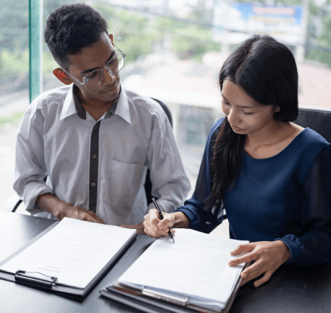 A team compares source and target files during Vietnamese Translation Services for businesses and individuals.