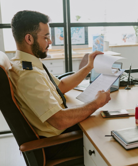 Translator compare pages during USCIS Certified Translation services in New York for attorney-ready filings.