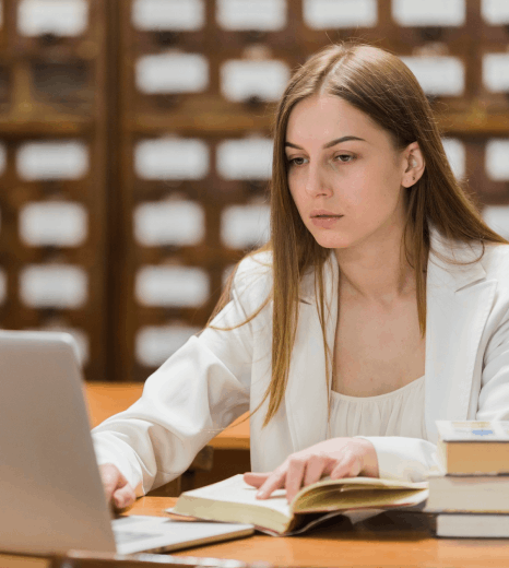A university coordinator compares course syllabi as Bulgarian translation services align academic terms across curricula.