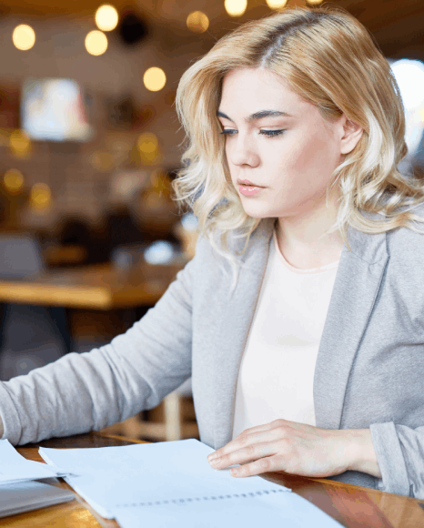 A staff member reviews a bilingual email thread using Slovak translation services to keep document communication accurate.