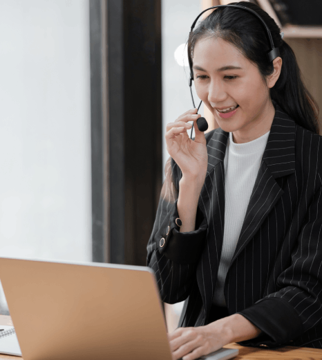 Professional transcriber working on live event recordings through Entertainment transcription services.