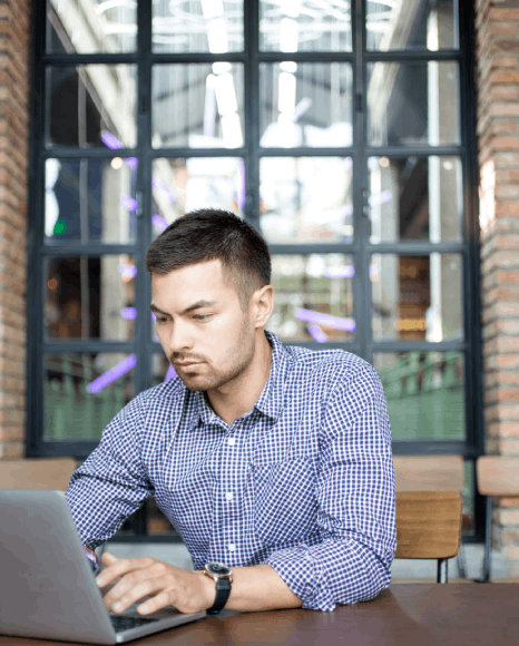 Typesetters working on a laptop