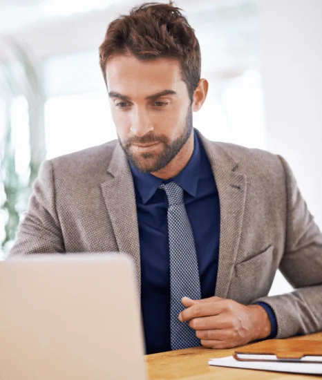 An analyst compares a bank statement to the source file, using fast translation services for secure financial records.